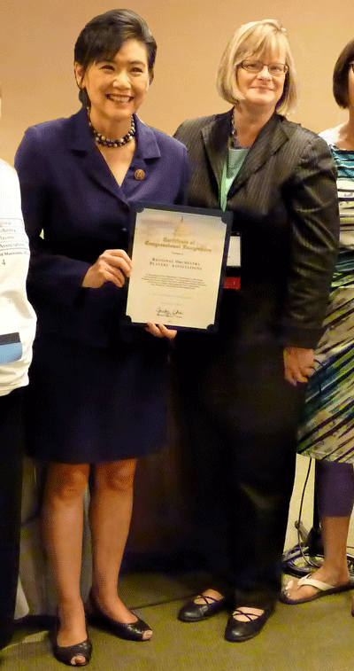 U.S. Rep. Judy Chu (D-CA, 27th District) presents ROPA President Carla Lehmeier-Tatum with a certificate of Congressional recognition. 
